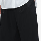 Bermuda plissettati con cintura in nero Simone rocha - uomo 