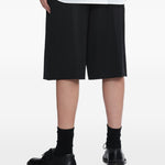 Bermuda plissettati con cintura in nero Simone rocha - uomo 
