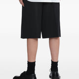 Bermuda plissettati con cintura in nero Simone rocha - uomo 