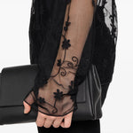 Blusa trasparente con ricamo a fiori in nero Toteme - donna 