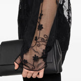 Blusa trasparente con ricamo a fiori in nero Toteme - donna 