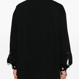 Camicia con abbottonatura in nero Undercover - uomo 