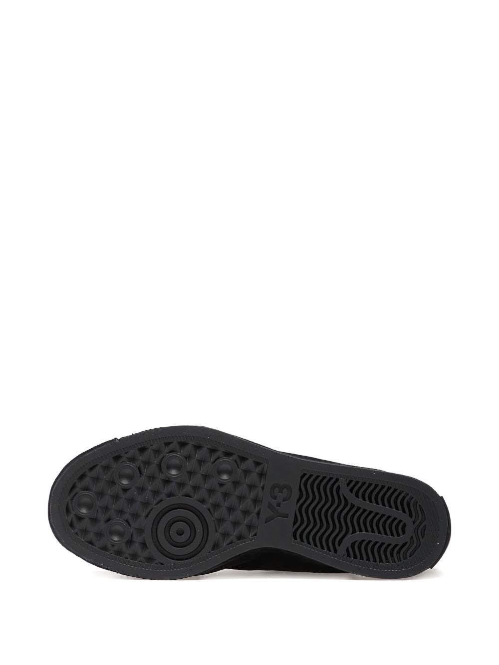 Sneakers con lacci e zip in nero 