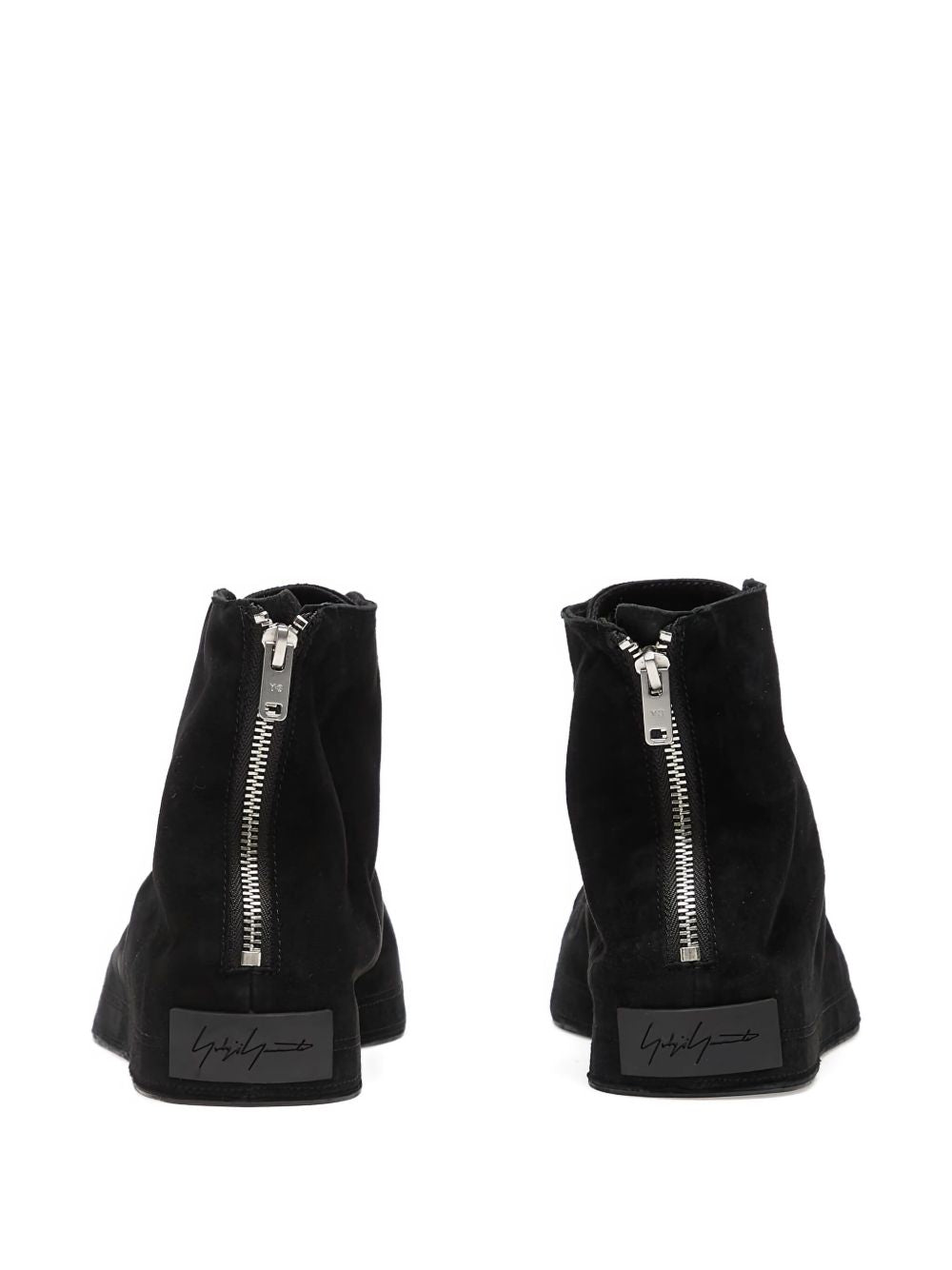 Sneakers con lacci e zip in nero 