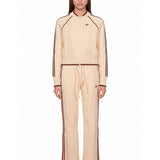 Pantaloni da tuta con cuciture a contrasto in beige 