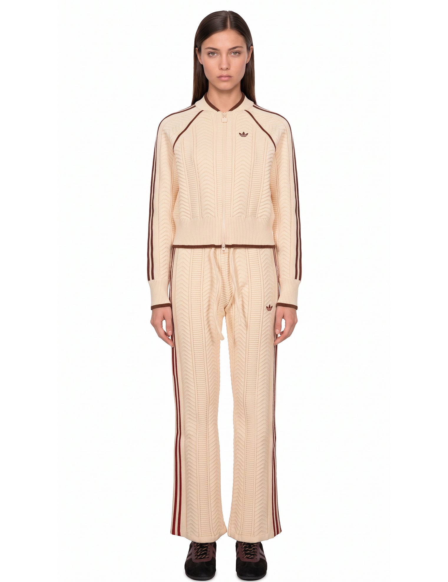 Pantaloni da tuta con cuciture a contrasto in beige 