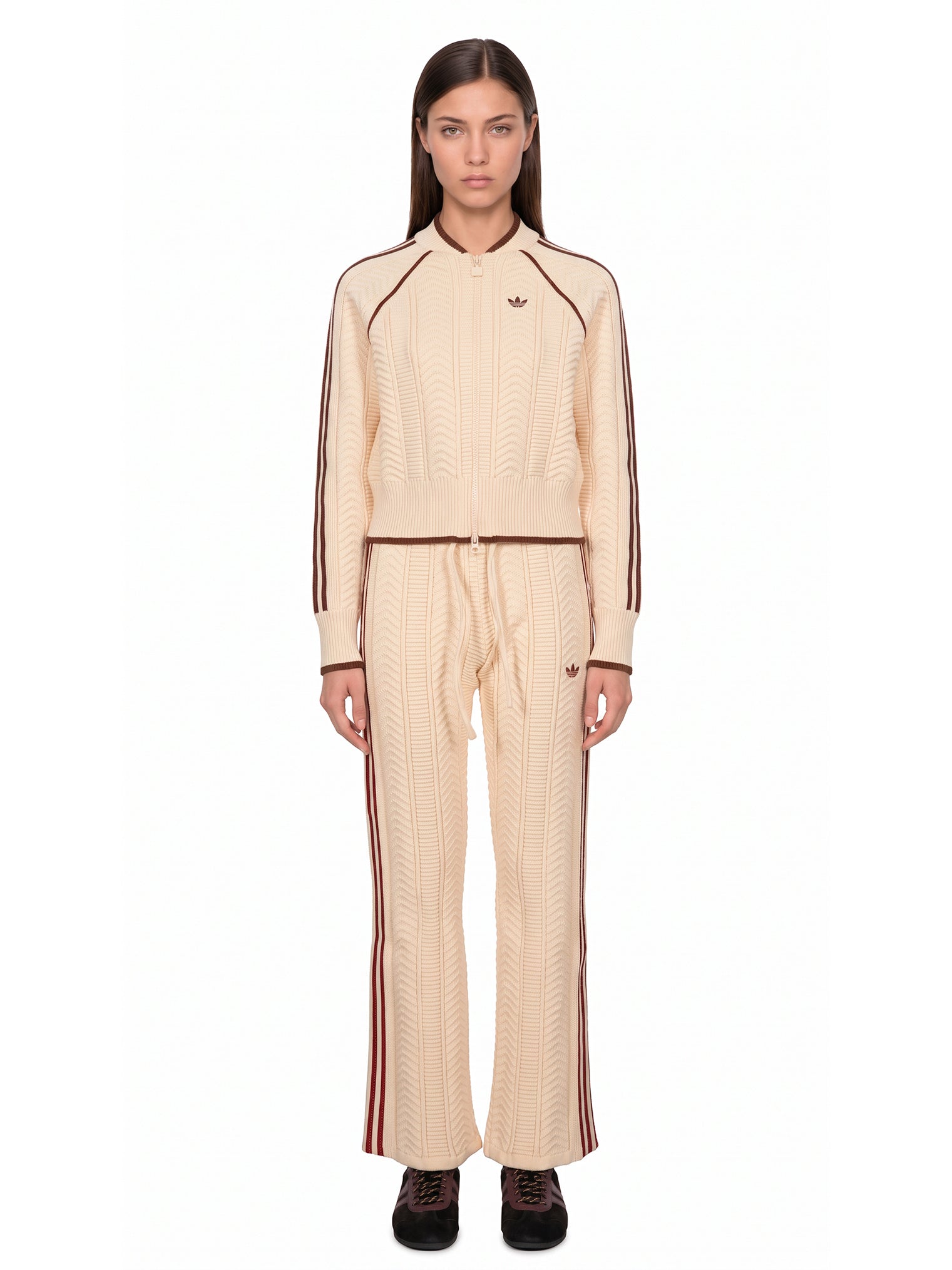 Pantaloni da tuta con cuciture a contrasto in beige 