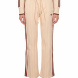 Pantaloni da tuta con cuciture a contrasto in beige 