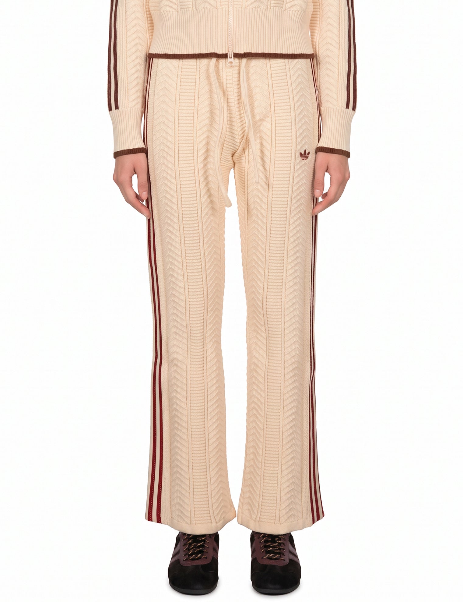 Pantaloni da tuta con cuciture a contrasto in beige 