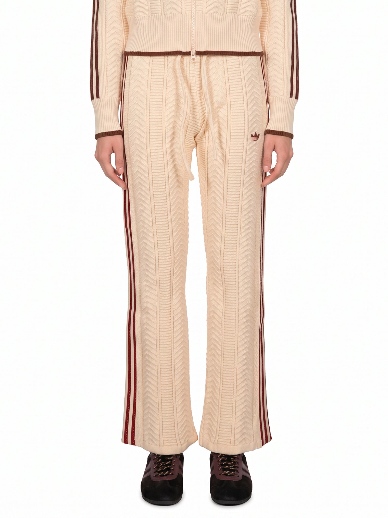 Pantaloni da tuta con cuciture a contrasto in beige 