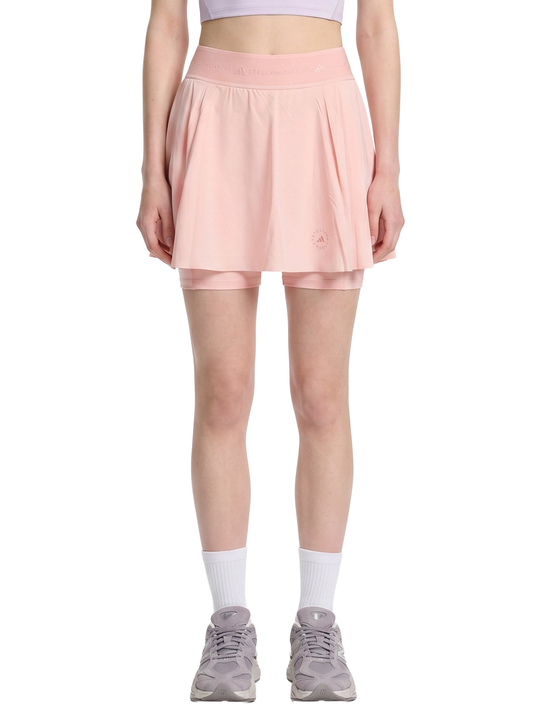 Skort a pieghe con in rosa 