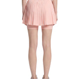 Skort a pieghe con in rosa 