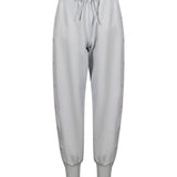 Pantaloni tuta con logo in grigio 