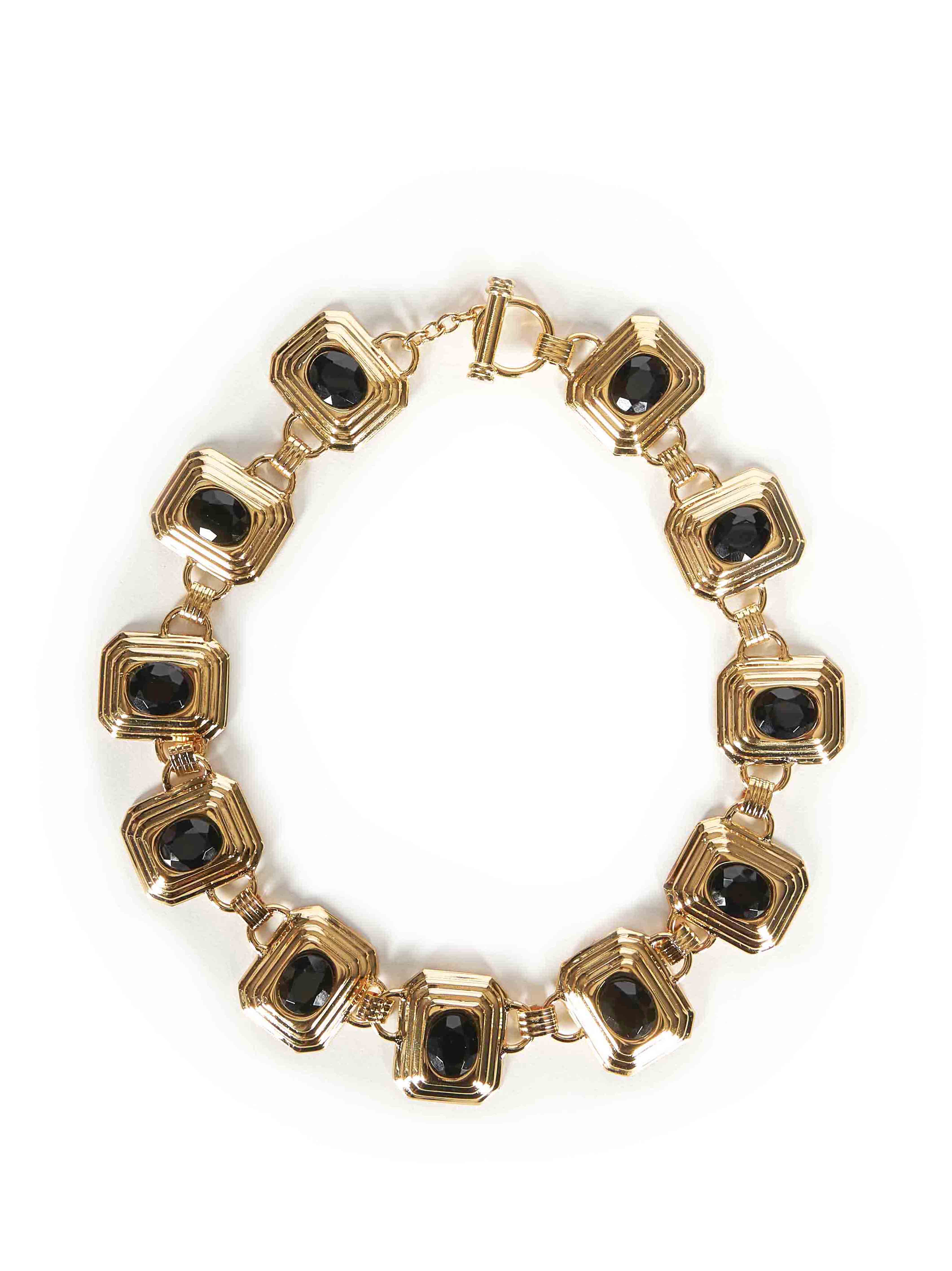 Collana in metallo e cristalli in nero e oro 