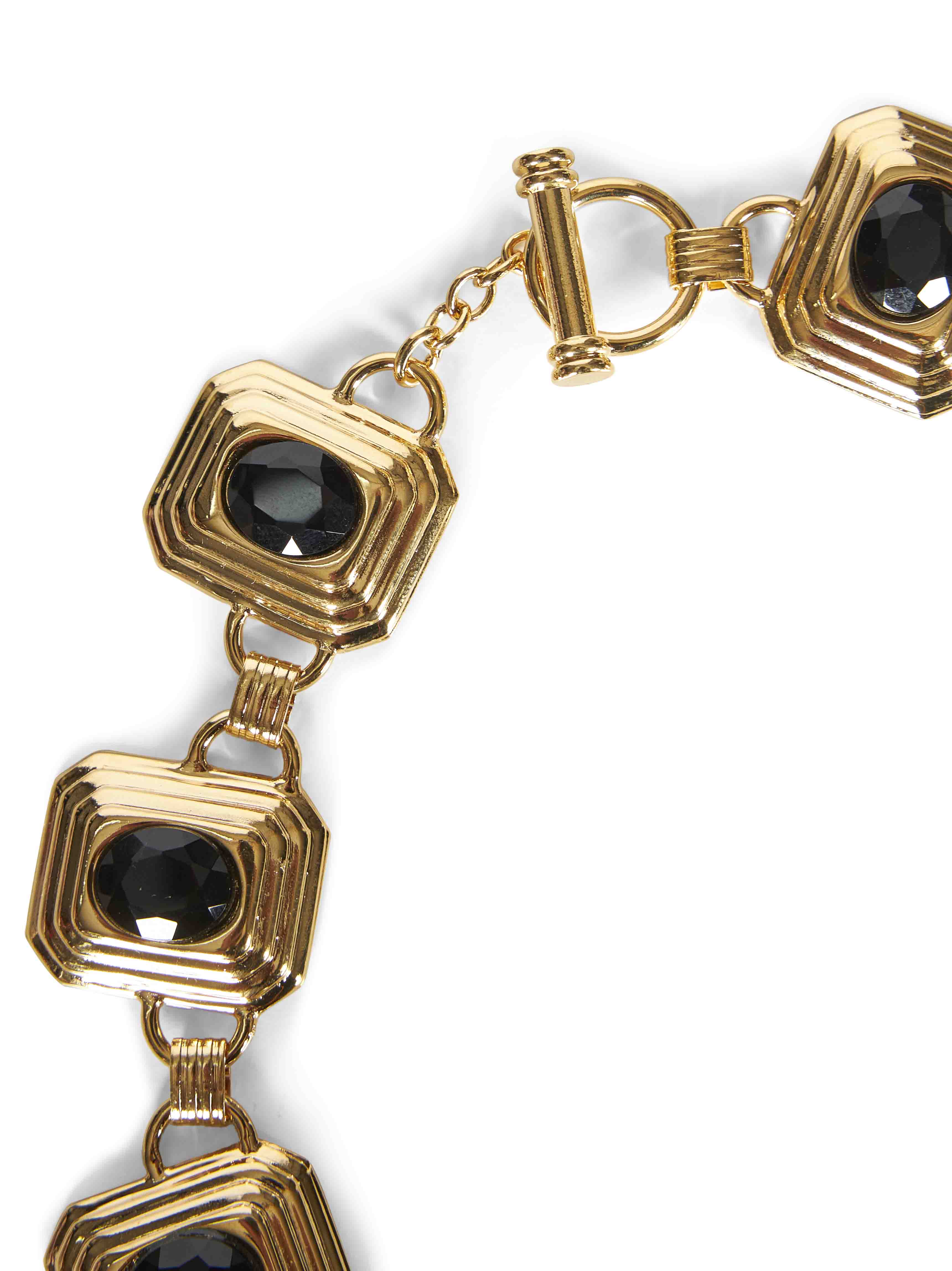 Collana in metallo e cristalli in nero e oro 