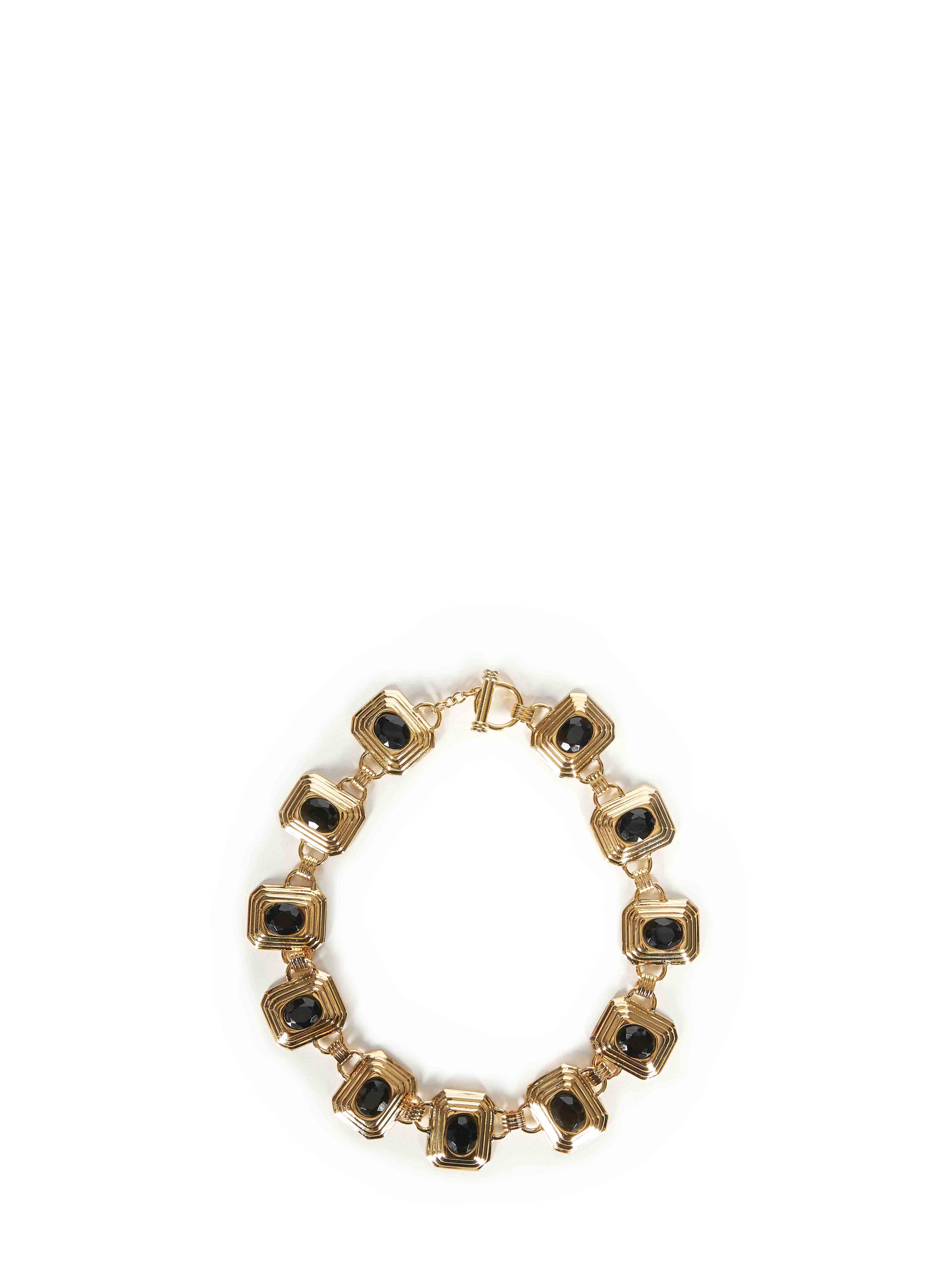 Collana in metallo e cristalli in nero e oro 
