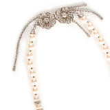 Collana di perle con chiusura floreale 