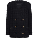 Giacca doppiopetto in tweed bouclé a quadri in nero 