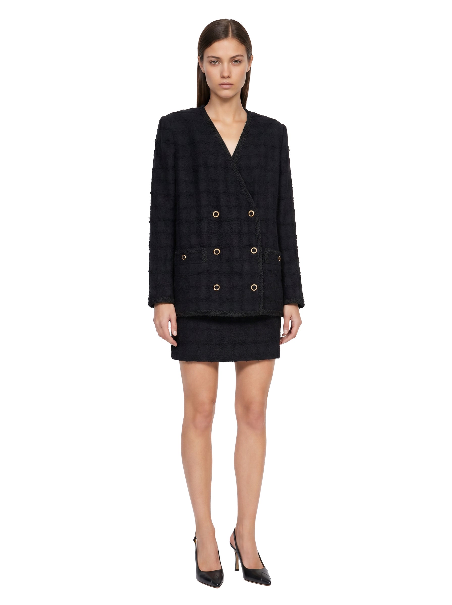 Giacca doppiopetto in tweed bouclé a quadri in nero 