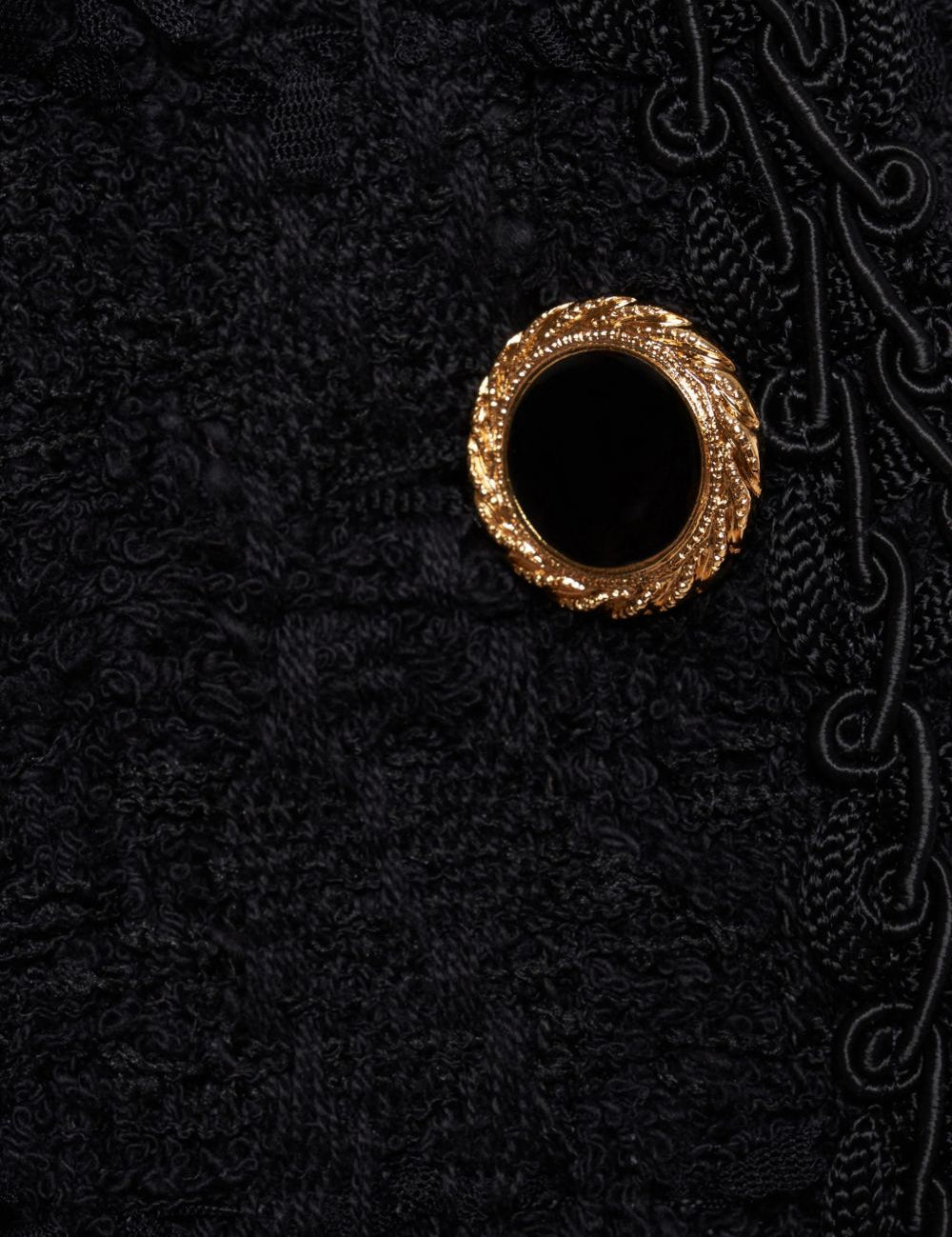 Giacca doppiopetto in tweed bouclé a quadri in nero 