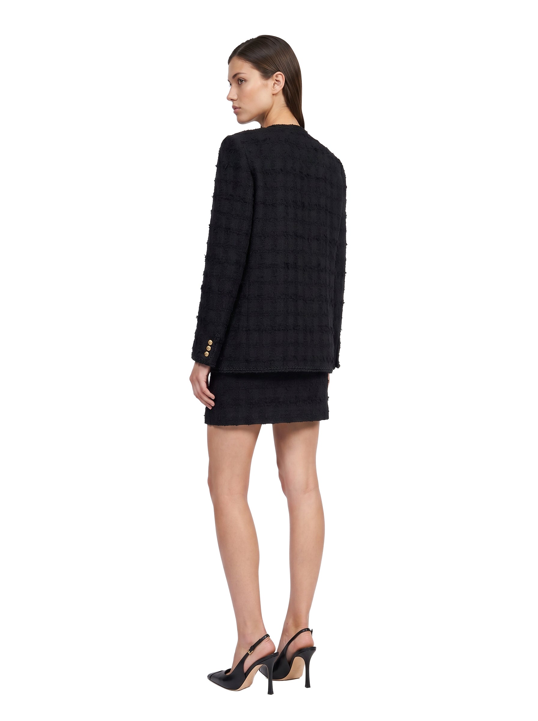 Giacca doppiopetto in tweed bouclé a quadri in nero 