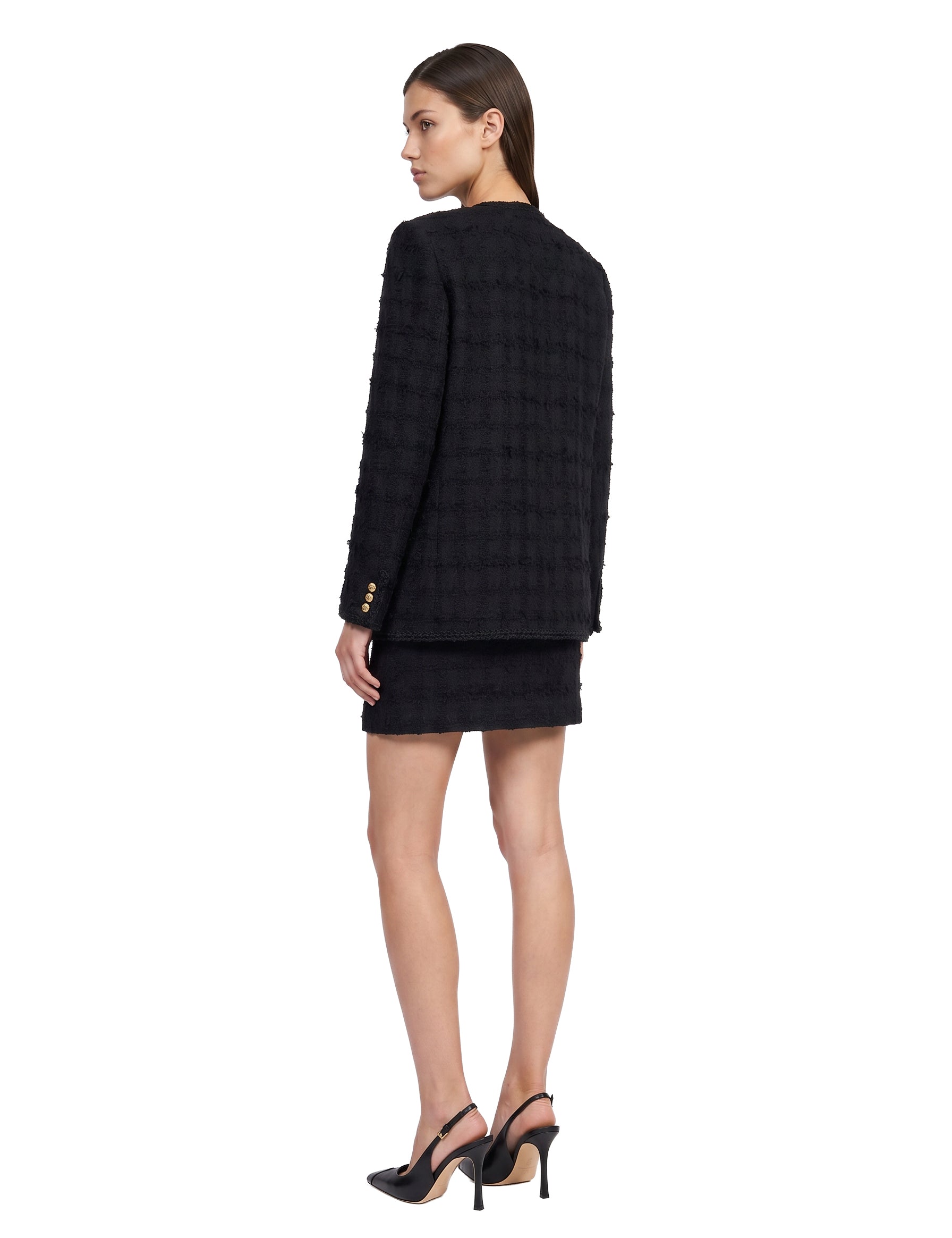 Giacca doppiopetto in tweed bouclé a quadri in nero 