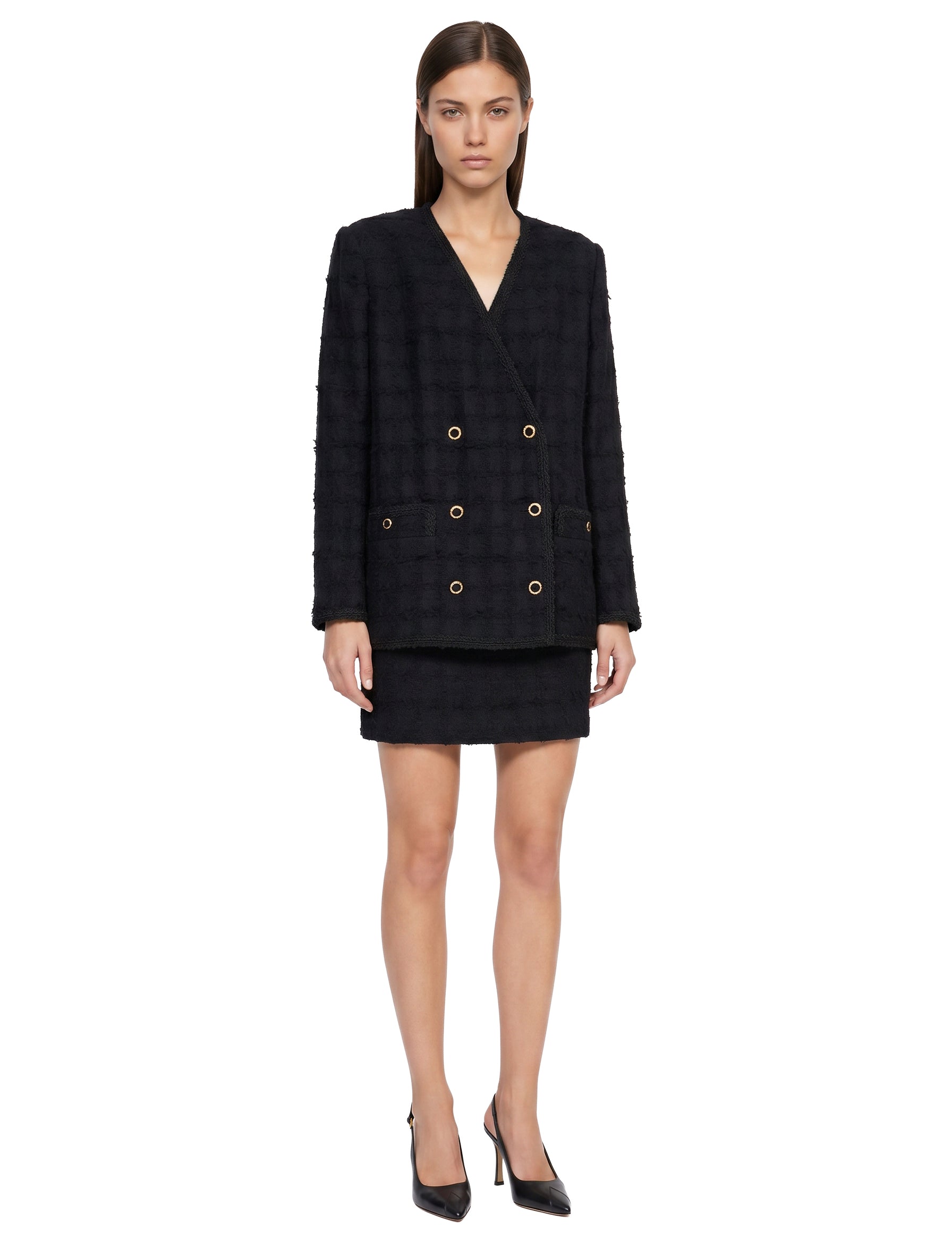Giacca doppiopetto in tweed bouclé a quadri in nero 