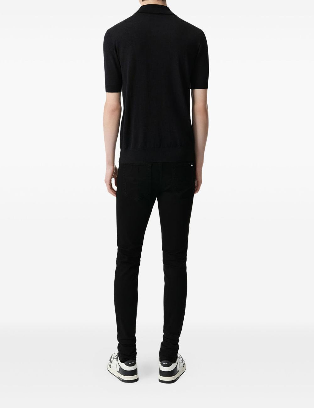 Jeans MX1 con strappi in nero 