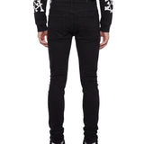 Jeans MX1 con strappi in nero 