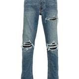 Jeans con strappi in blu 