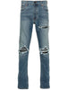 Distressed blue jeans