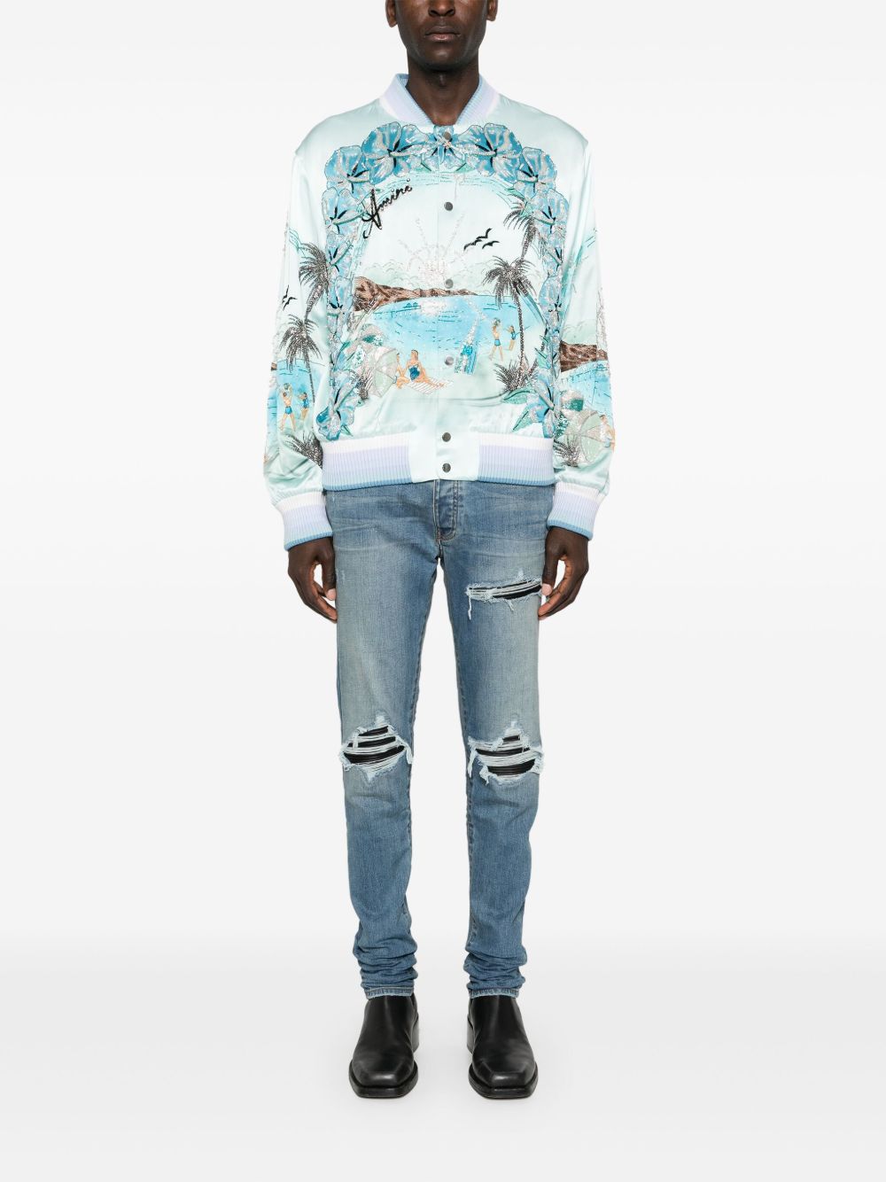 Jeans con strappi in blu 
