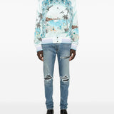Jeans con strappi in blu 