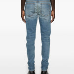 Jeans con strappi in blu 