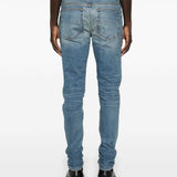 Jeans con strappi in blu 