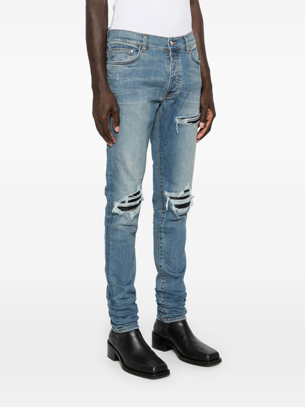 Jeans con strappi in blu 