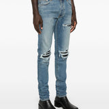 Jeans con strappi in blu 