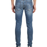Jeans con strappi in blu 