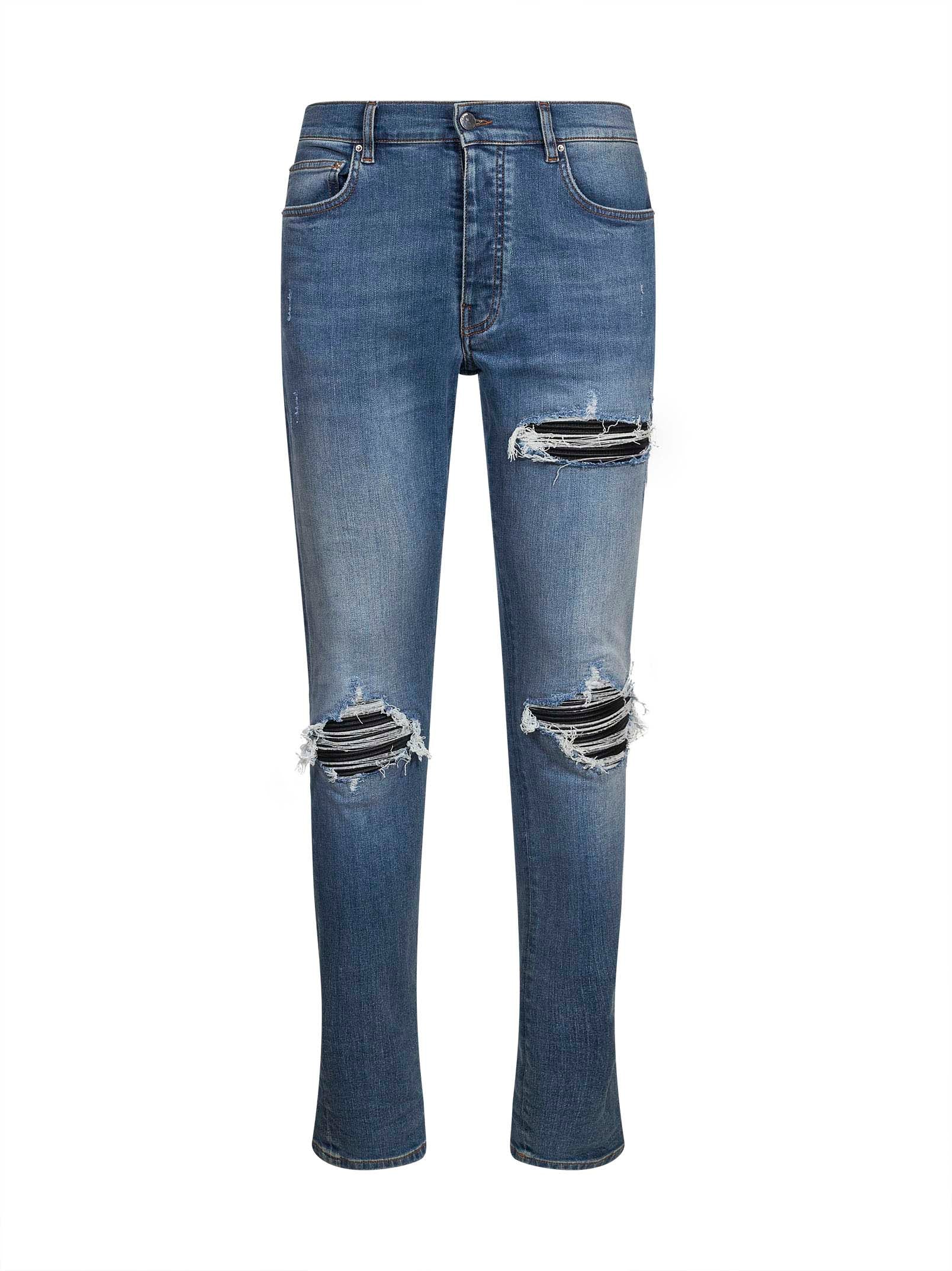 Jeans con strappi in blu 