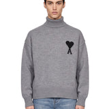 Maglione collo alto in lana grigio 