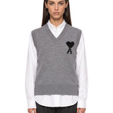 Gilet con intarsio a cuore in grigio 