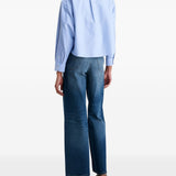 Camicia crop con logo in celeste 
