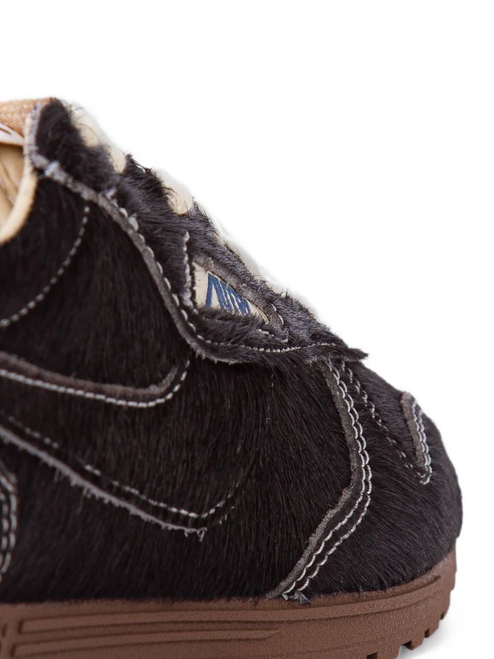 Sneakers basse windspin in marrone 