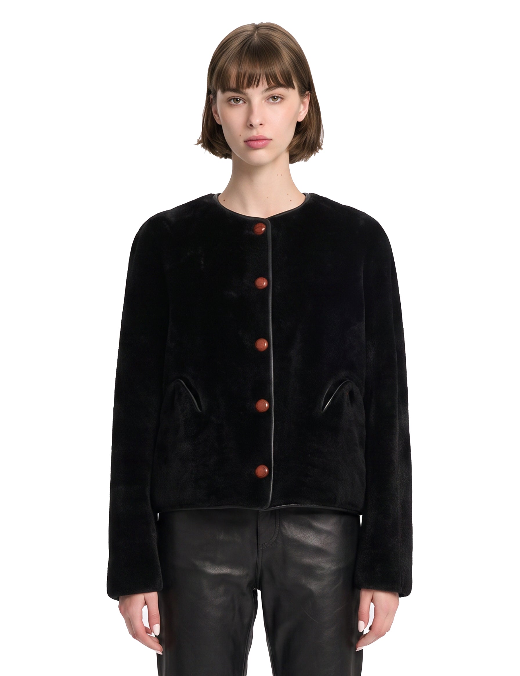Giacca in montone con abbottonatura in nero 