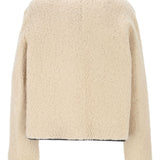 Giacca in montone con abbottonatura in beige 