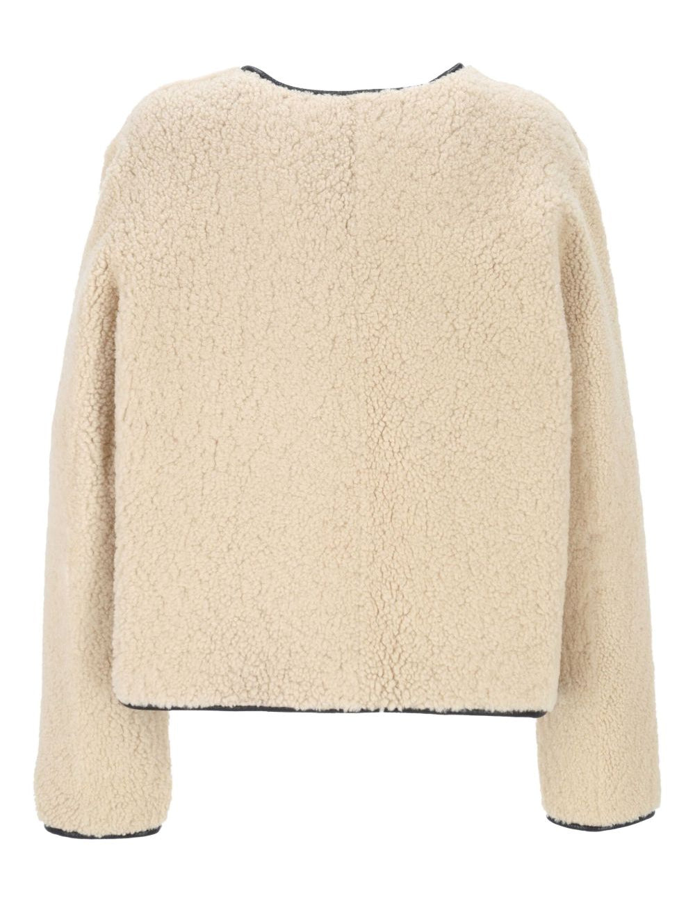 Giacca in montone con abbottonatura in beige 