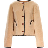 Giacca in montone con abbottonatura in beige 