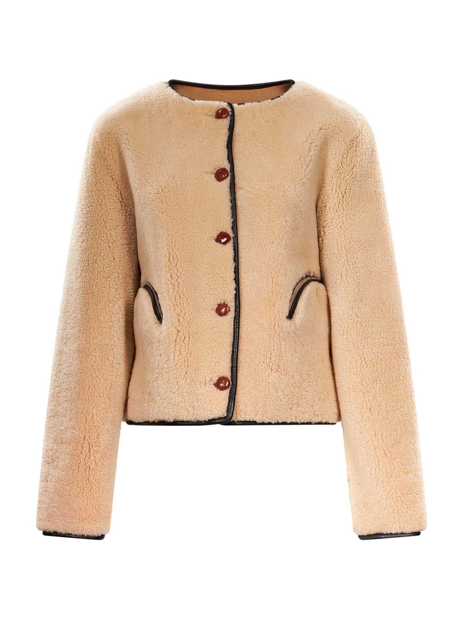 Giacca in montone con abbottonatura in beige 