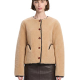 Giacca in montone con abbottonatura in beige 