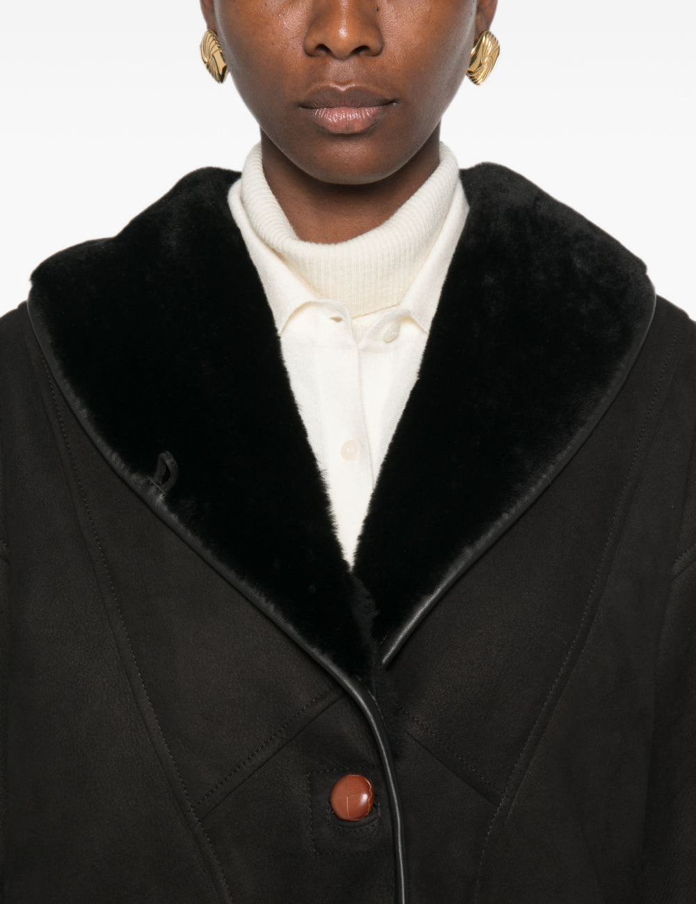 Giacca in shearling con le tasche in nero 
